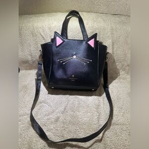 Black cat ears/whisker purse. Easy to clean with wet rag. Used only 3 times.